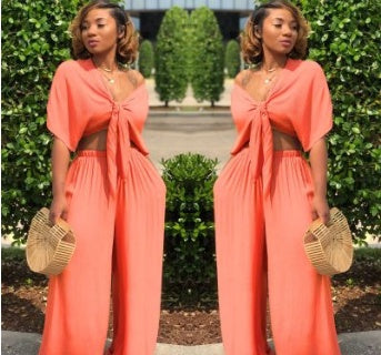 A two-piece solid color wide-leg trouser suit
